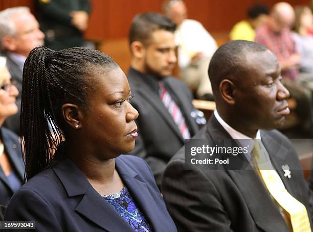 Sybrina Fulton , the mother of shooting victim Trayvon Martin, and her attorney Benjamin Crump attend a pre-trial hearing May 28, 2013 in Sanford,...