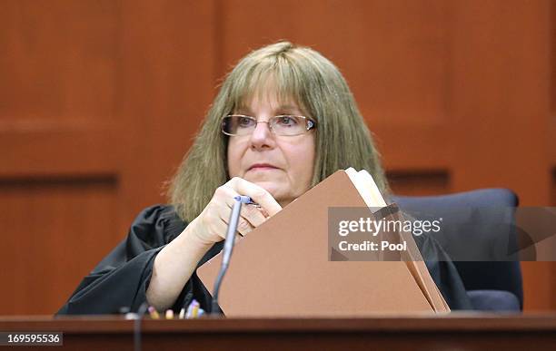 Circuit Judge Debra Nelson listens to defense attorney Mark O'Mara, during a pre-trial hearing May 28, 2013 in Sanford, Florida. George Zimmerman,...