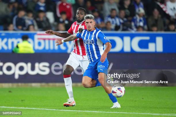 Javi Lopez of Deportivo Alaves is put under pressure by Inaki Williams of Athletic Club during the LaLiga EA Sports match between Deportivo Alaves...