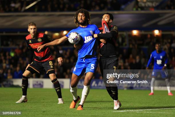 Dion Sanderson of Birmingham City is challenged by of Queens Park Rangers during the Sky Bet Championship match between Birmingham City and Queens...