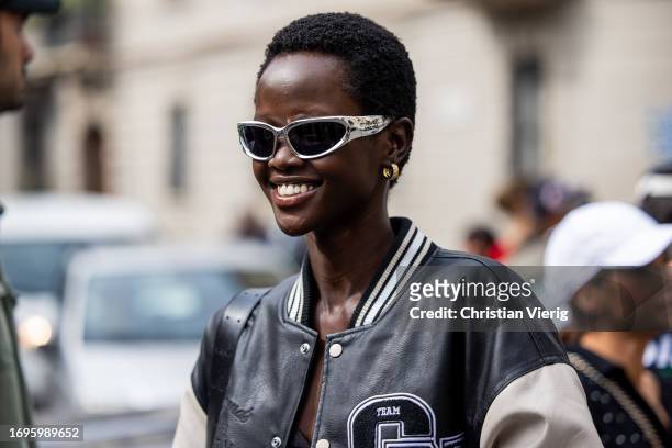Model wears silver sunglasses outside Philosophy during the Milan Fashion Week - Womenswear Spring/Summer 2024 on September 22, 2023 in Milan, Italy.