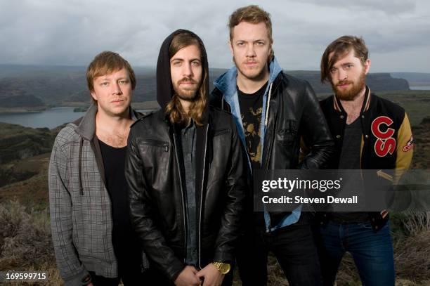 Ben McKee, Wayne Sermon and Dan Reynolds and Dan Platzman of Imagine Dragons poses for a portrait backstage on Day 4 of Sasquatch! Music Festival on...