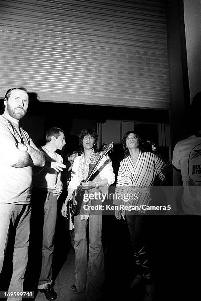 Charlie Watts, Keith Richards and Mick Jagger of the Rolling Stones are photographed backstage in June 1975 in San Antonio, Texas. CREDIT MUST READ:...