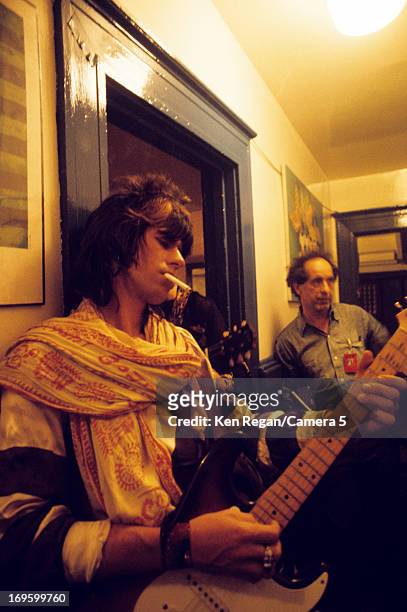 Keith Richards of, The Rolling Stones and Robert Frank are photographed backstage in 1972 in Long Beach, California. CREDIT MUST READ: Ken...