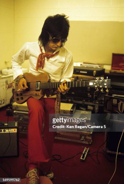 Ronnie Wood of the Rolling Stones is photographed backstage in the 1970's. CREDIT MUST READ: Ken Regan/Camera 5 via Contour by Getty Images.