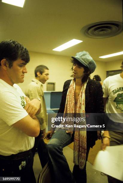 Charlie Watts and Keith Richards of the Rolling Stones are photographed backstage in 1975. CREDIT MUST READ: Ken Regan/Camera 5 via Contour by Getty...