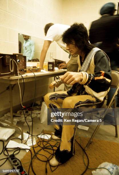 Ronnie Wood of the Rolling Stones is photographed backstage in the 1970's. CREDIT MUST READ: Ken Regan/Camera 5 via Contour by Getty Images.