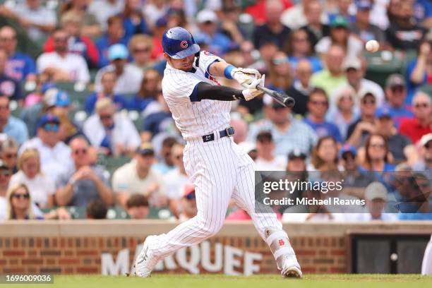 Seiya Suzuki of the Chicago Cubs hits a two-run home run off Noah Davis of the Colorado Rockies during the fourth inning at Wrigley Field on...