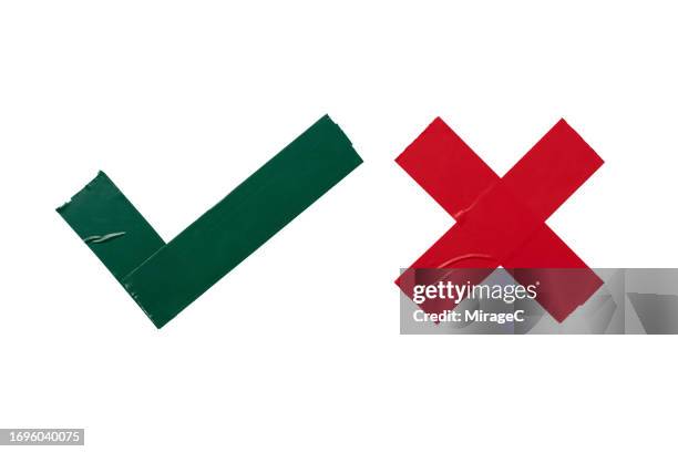 duct tape green tick and red x mark isolated on white - attraversare foto e immagini stock