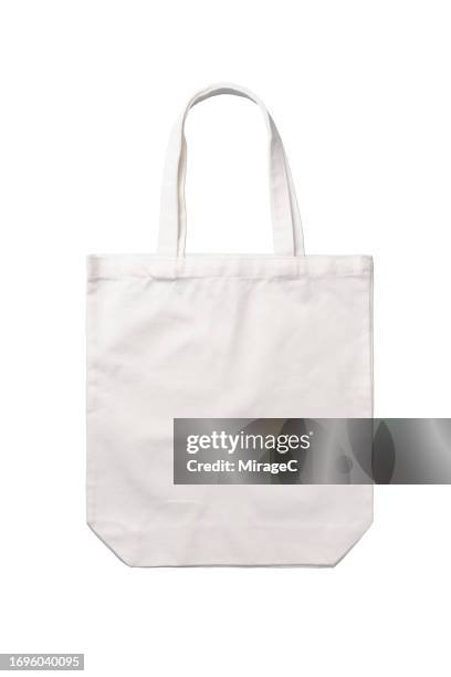 reusable blank white tote bag isolated on white - トートバッグ ストックフォトと画像