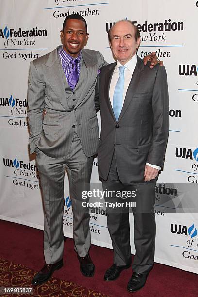 Personality Nick Cannon and President and CEO of Viacom Philippe Dauman attend the UJA-Federation Of New York Entertainment, Media And Communications...