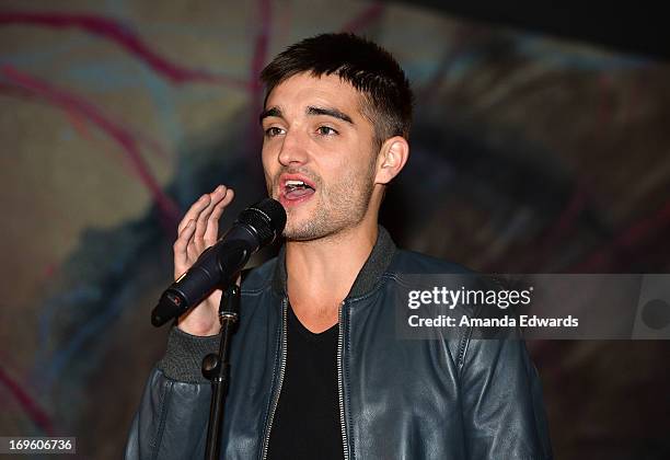 Singer Tom Parker of the band The Wanted performs onstage at the 102.7 KIIS FM and E! viewing party for the premiere of "The Wanted Life" at W...