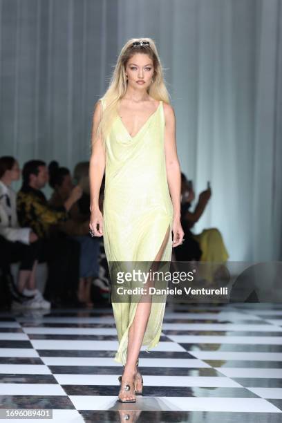 Gigi Hadid walks the runway at the Versace fashion show during the Milan Fashion Week Womenswear Spring/Summer 2024 on September 22, 2023 in Milan,...