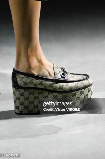 Model walks the runway during the Gucci Ready to Wear Spring/Summer 2024 fashion show as part of the Milan Fashion Week on September 22, 2023 in...