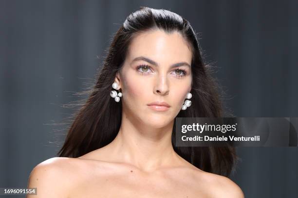 Vittoria Ceretti walks the runway at the Versace fashion show during the Milan Fashion Week Womenswear Spring/Summer 2024 on September 22, 2023 in...