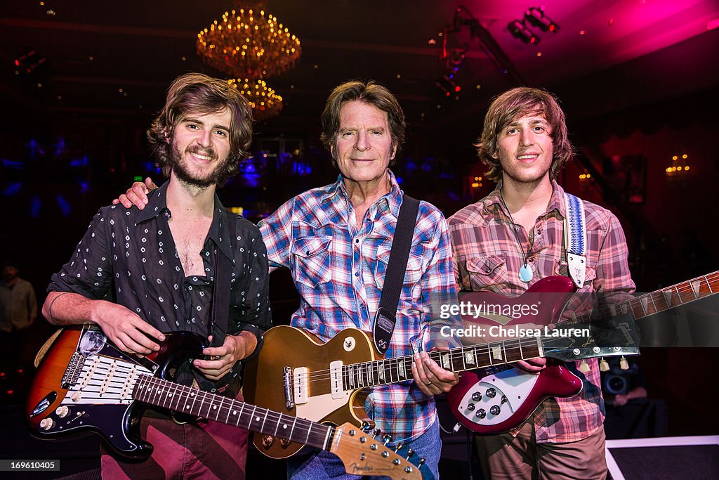 Musician John Fogerty poses with sons Tyler Fogerty and Shane Fogerty