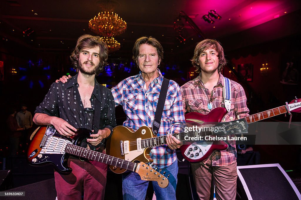 Musician John Fogerty poses with sons Tyler Fogerty and Shane Fogerty