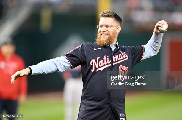Sean Doolittle of the Washington Nationals throws out the ceremonial first pitch before the game between the Atlanta Braves and the Washington...