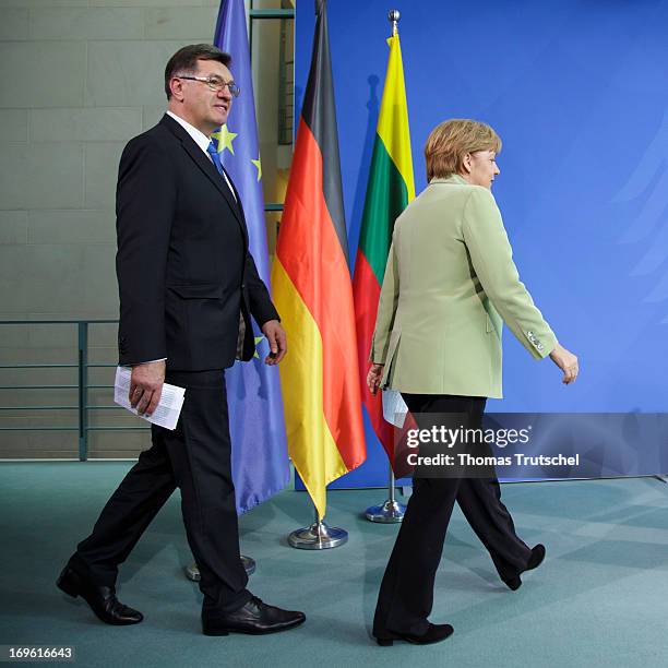 German Chancellor Angela Merkel and Lithuanian prime minister Algirdas Butkevicius are pictured before a press conference after their meeting at the...