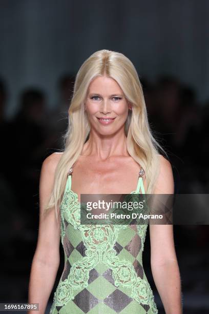 Claudia Schiffer, beauty detail, walks the runway at the Versace fashion show during the Milan Fashion Week Womenswear Spring/Summer 2024 on...