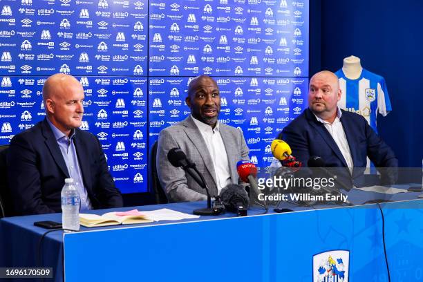 Darren Moore attends his first press conference since being appointed first team manager of Huddersfield Town at Millers Oils High Performance...
