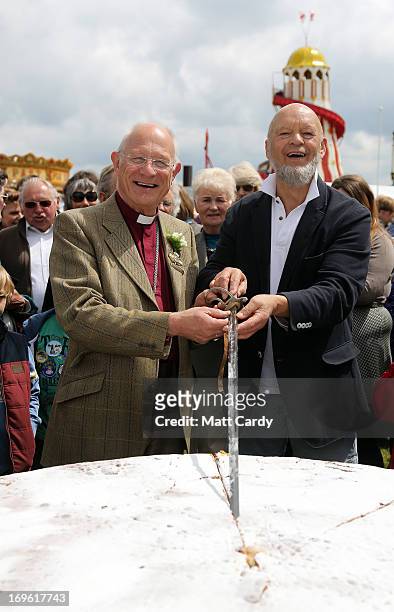 Glastonbury Festival founder Micheal Eavis and the Bishop of Bath and Wells, The Rt Revd Peter Price cut a giant cake to open the Royal Bath and West...