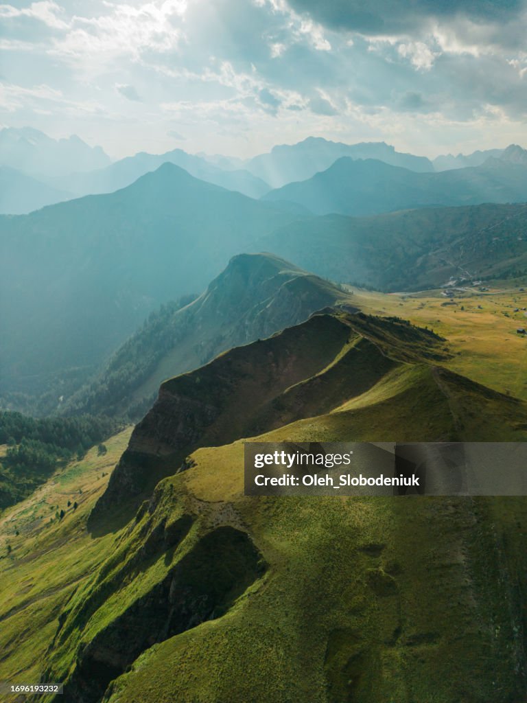 Aerial view of Dolomites mountains at sunset in summer