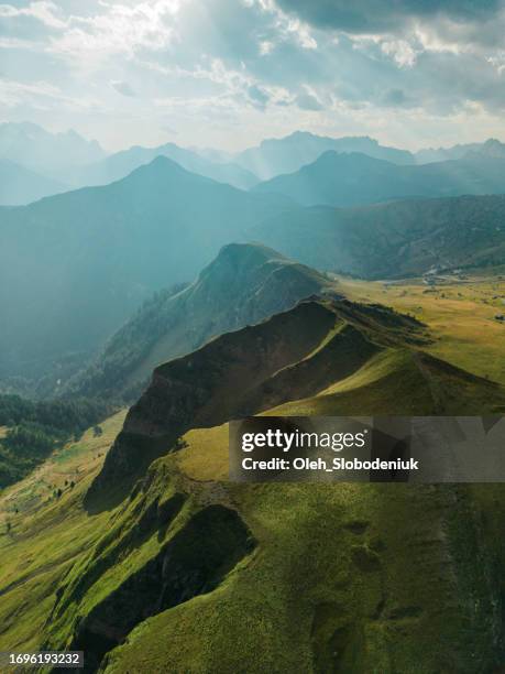aerial view of dolomites mountains at sunset in summer - mountain ridge stock pictures, royalty-free photos & images