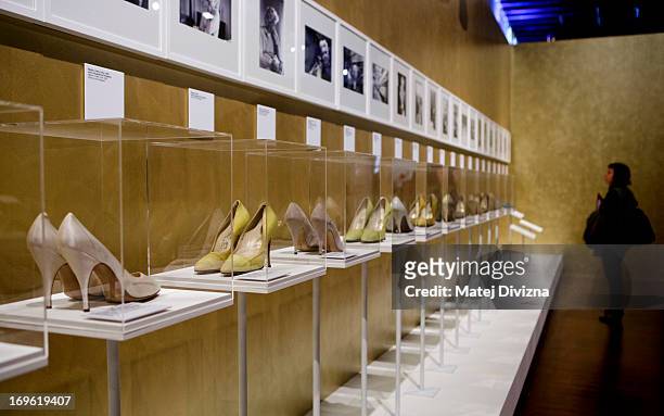 Visitor looks at the shoe collection during a press preview of the 'Marilyn' exhibition at Prague Castle on May 29, 2013 in Prague, Czech Republic....