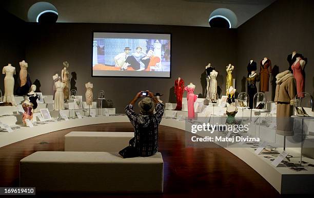 Visitor takes photos during a press preview of the 'Marilyn' exhibition at Prague Castle on May 29, 2013 in Prague, Czech Republic. The exhibition...