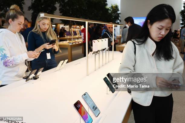 New Apple iPhone 15 models are displayed in the Apple The Grove store on the phone’s worldwide release day on September 22, 2023 in Los Angeles,...