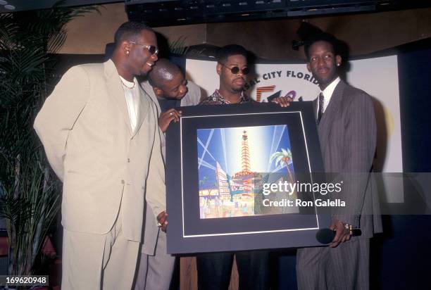 Group Boyz II Men attends the Press Conference to Announce the Newest Location of Motown Cafe at Universal Studios Florida's E-Zone on July 9, 1996...