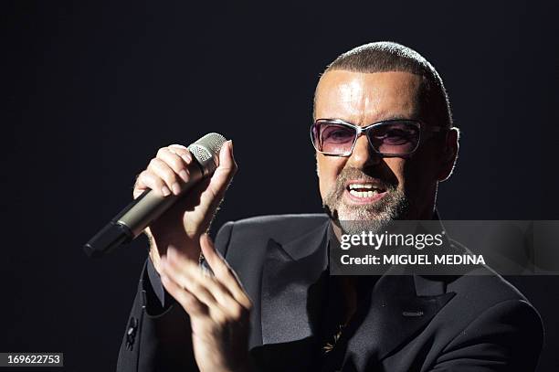 In this file picture taken on September 9 British singer George Michael performs on stage during a charity gala for the benefit of Sidaction, at the...