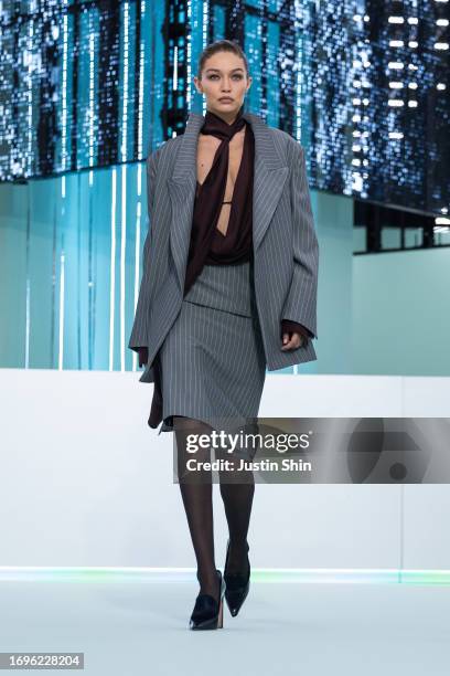 Gigi Hadid walks the runway at the Boss fashion show during the Milan Fashion Week Womenswear Spring/Summer 2024 on September 22, 2023 in Milan,...