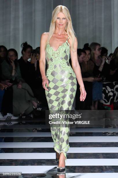 Claudia Schiffer walks the runway during the Versace Ready to Wear Spring/Summer 2024 fashion show as part of the Milan Fashion Week on September 22,...