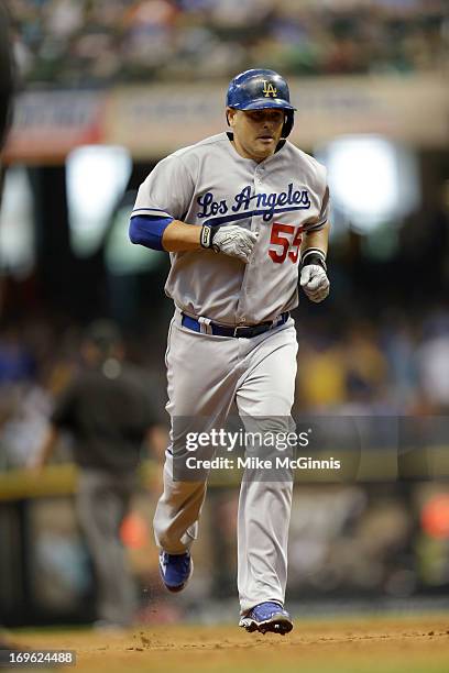 Ramon Hernandez of the Los Angeles Dodgers runs the bases after hitting a solo home run in the top of the third inning against the Milwaukee Brewers...