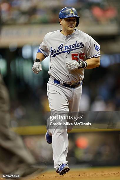 Ramon Hernandez of the Los Angeles Dodgers runs the bases after hitting a solo home run in the top of the third inning against the Milwaukee Brewers...