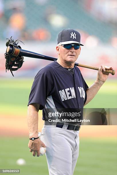First coach Mick Kelleher of the New York Yankees looks on during batting practice of a a baseball game against the Baltimore Orioles on May 22, 2013...