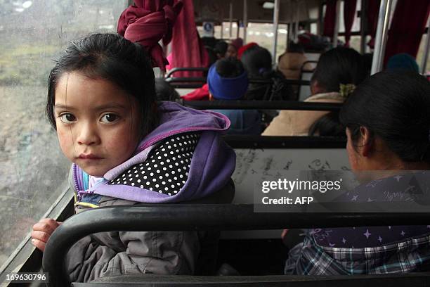 Local farmers from the Trapa Trapa area, in the vicinity of the Copahue volcano, Bio Bio region, Chile, are taken to a shelter on May 29, 2013. Chile...