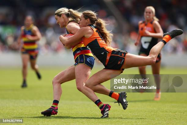 Yvonne Bonner of the Crows is tackled by Tarni Evans of the Giants during the round four AFLW match between Greater Western Sydney Giants and...