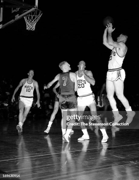 Red Kerr Red Kerr of the Syracuse Nationals shoots against the New York Knicks ...