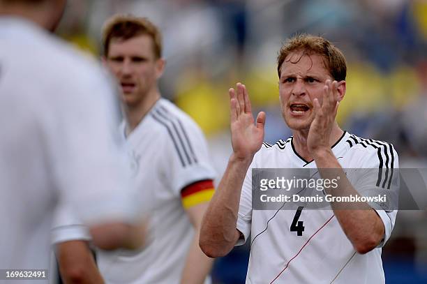 Benedikt Hoewedes of Germany reacts during the International Friendly match between Ecuador and Germany at FAU stadium on May 29, 2013 in Boca Raton,...