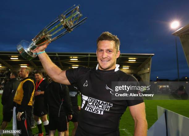 Jimmy Gopperth of Newcastle Falcons lifts the Championship trophy after victory over Bedford Blues in the RFU Championship play off final second leg...