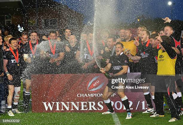 Jimmy Gopperth of Newcastle Falcons leads the celebrations as Newcastle Falcons lift the Championship trophy after victory over Bedford Blues in the...