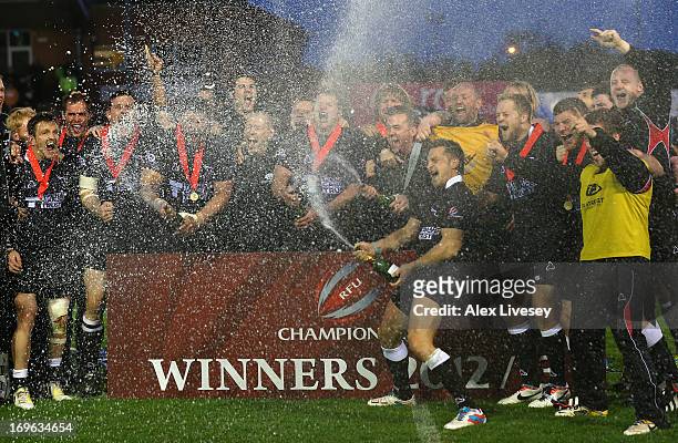 Jimmy Gopperth of Newcastle Falcons leads the celebrations as Newcastle Falcons lift the Championship trophy after victory over Bedford Blues in the...
