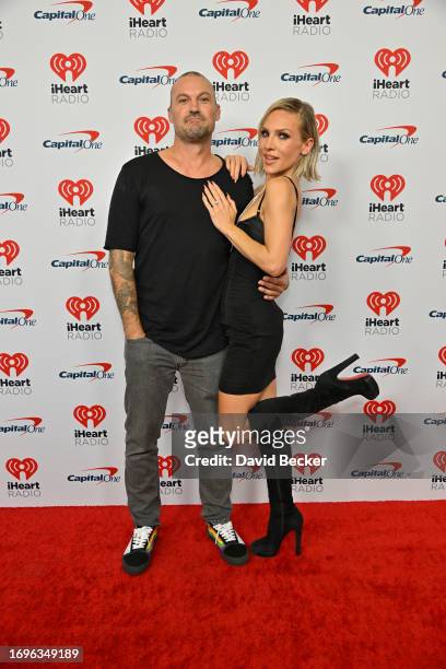 Brian Austin Green and Sharna Burgess attend the 2023 iHeartRadio Music Festival at T-Mobile Arena on September 22, 2023 in Las Vegas, Nevada.