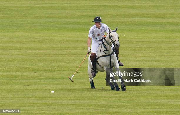 Prince William, Duke of Cambridge playing in the Audi Polo Challenge at Chester Racecourse on May 29, 2013 in Chester, England.