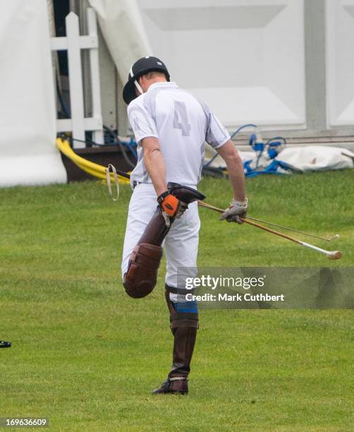 Prince William, Duke of Cambridge warms up before playing in the Audi Polo Challenge at Chester Racecourse on May 29, 2013 in Chester, England.