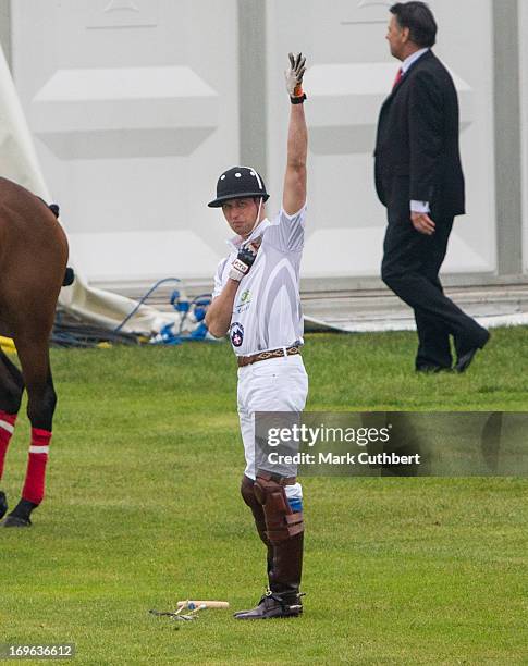 Prince William, Duke of Cambridge warms up before playing in the Audi Polo Challenge at Chester Racecourse on May 29, 2013 in Chester, England.