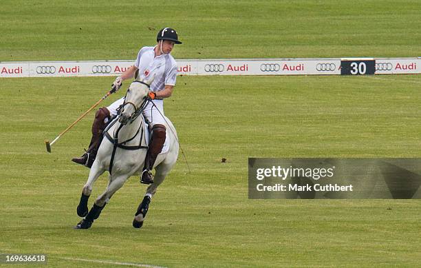 Prince William, Duke of Cambridge playing in the Audi Polo Challenge at Chester Racecourse on May 29, 2013 in Chester, England.